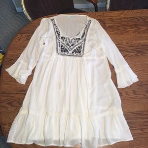 Maurice’s white and black peasant dress